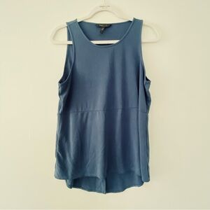 BCBG MAXAZRIA Sleeveless Indigo Top with back slit
Size Medium